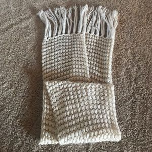 Knit cream colored scarf