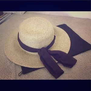 Hat with brown ribbon