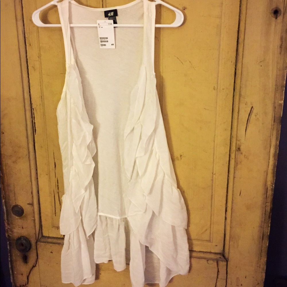 NWT White ruffled layer.