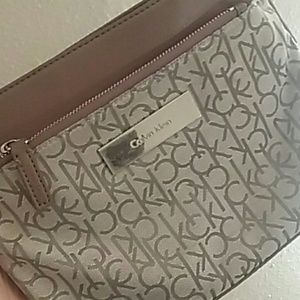 Calvin Klein purse with logo on fabric