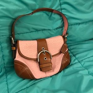 Coach.  Cute pink shoulder bag.