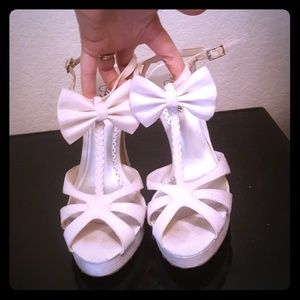 White heels with bow