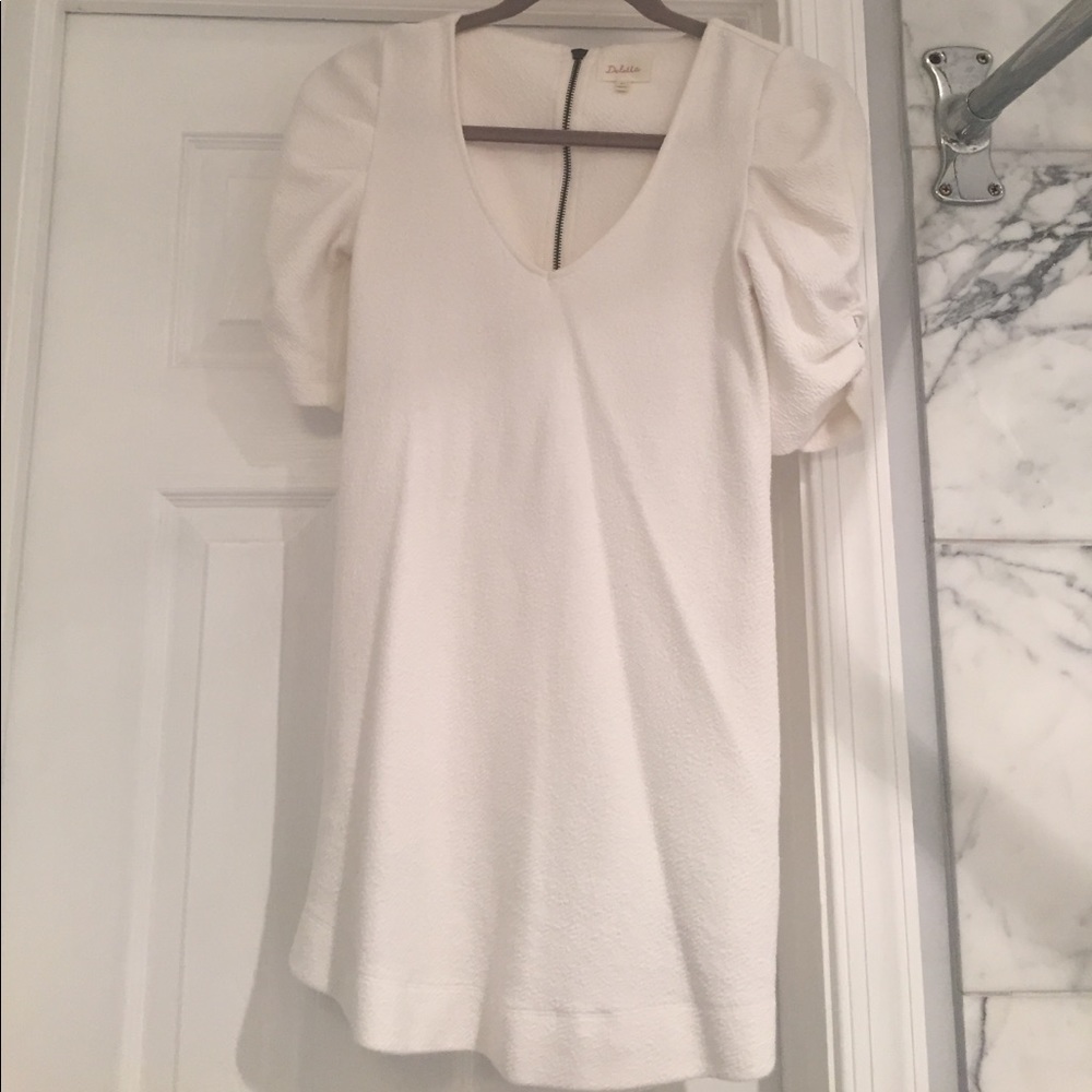 Anthropologie cream colored tunic.
