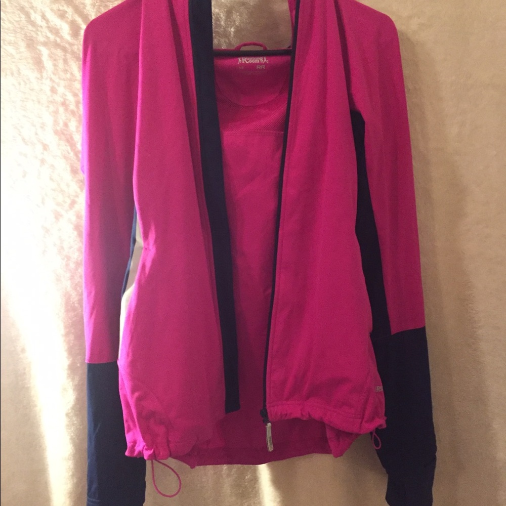 Never worn!! Lightweight running jacket