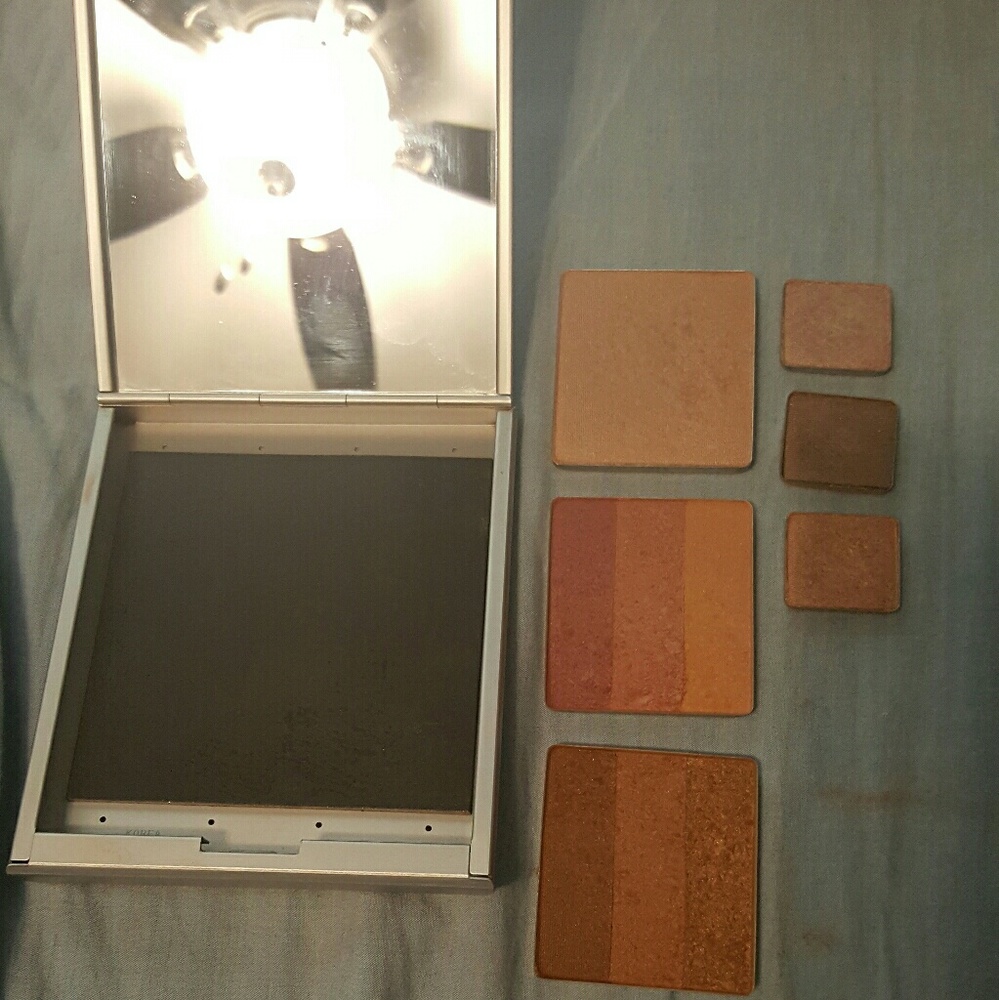 Aveda compact with makeup (hardly worn)