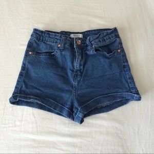 High waisted blue denim shorts
