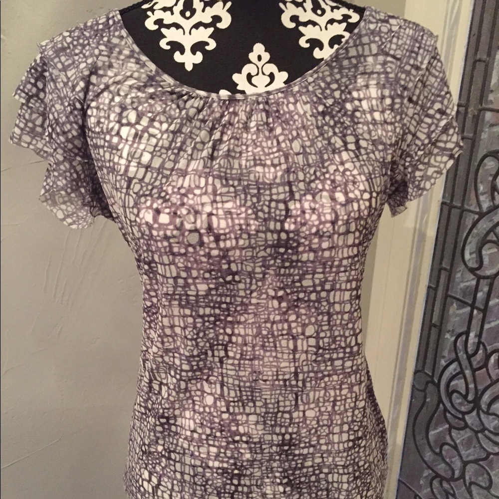 Abstract top