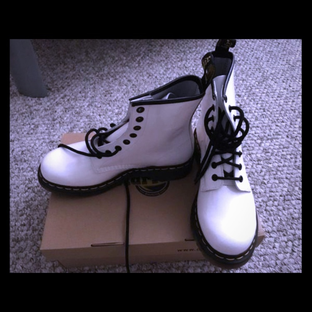 Doc Marten shiny white patent leather boots.