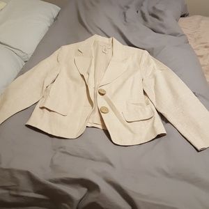 Cream blazer with ornate buttons