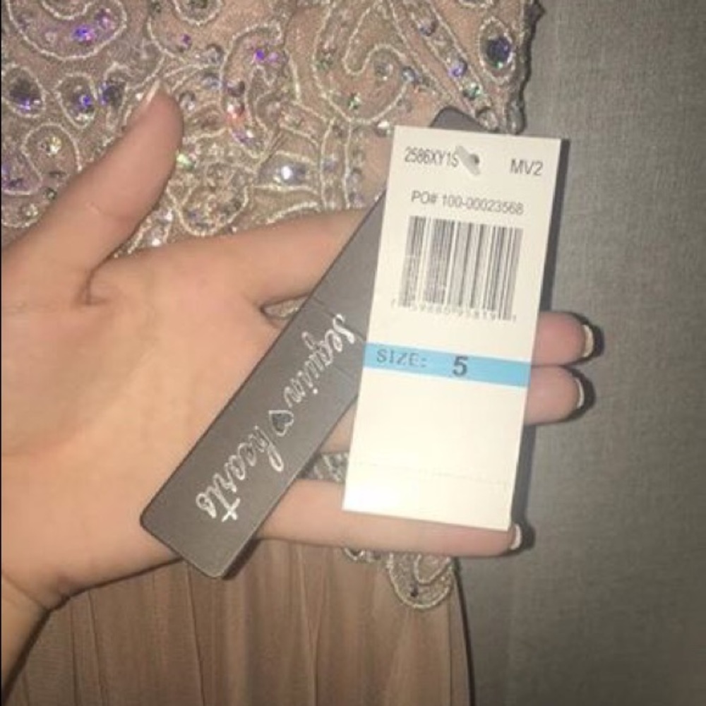 Formal dress. Size 5. Never been worn!