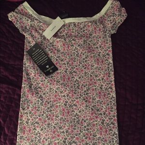 New Bebe dress with tags never worn.