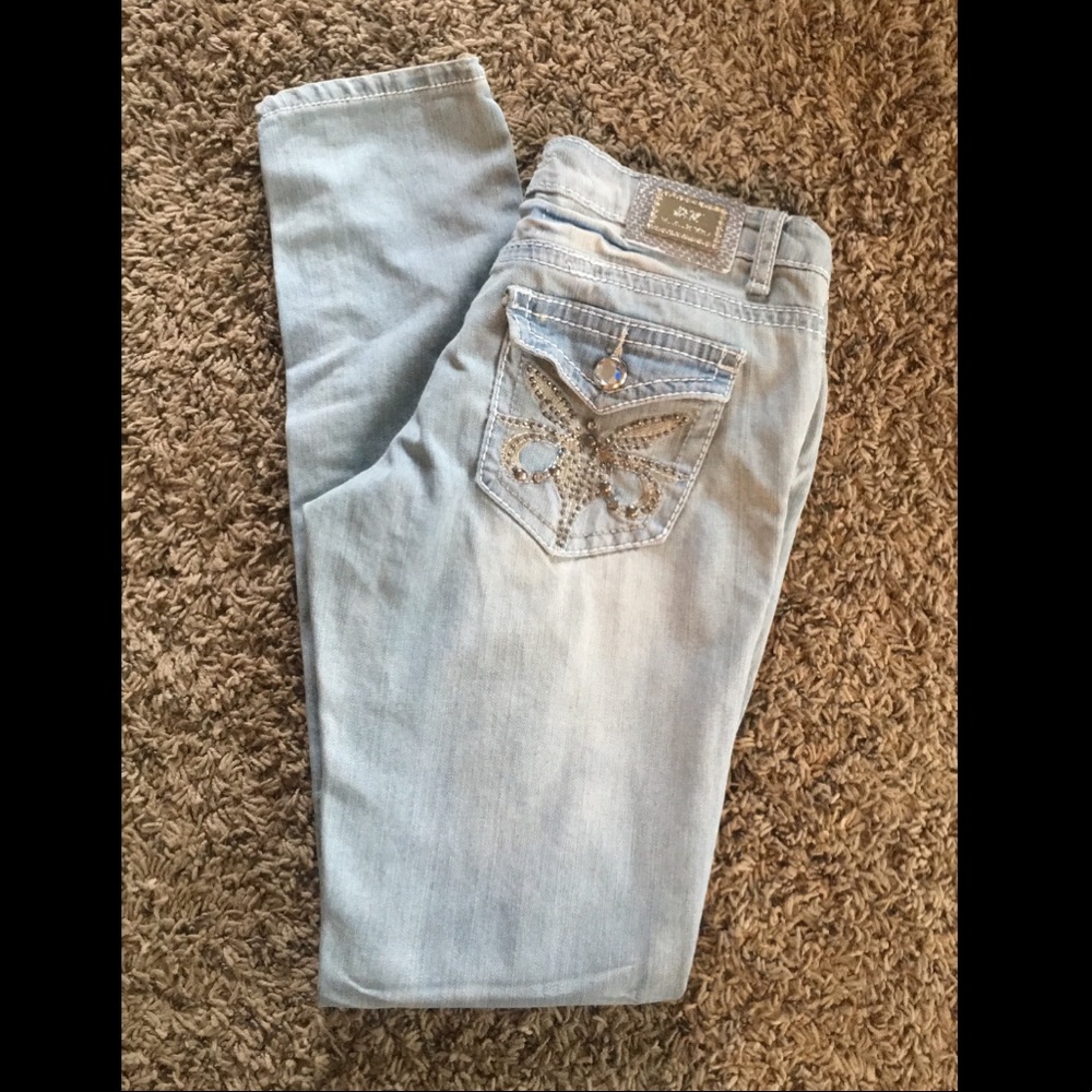 DISTRESSED TWELVE K JEANS