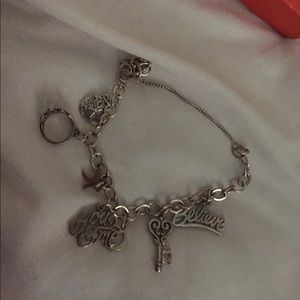 James Avery Bracelet & 7 charms.