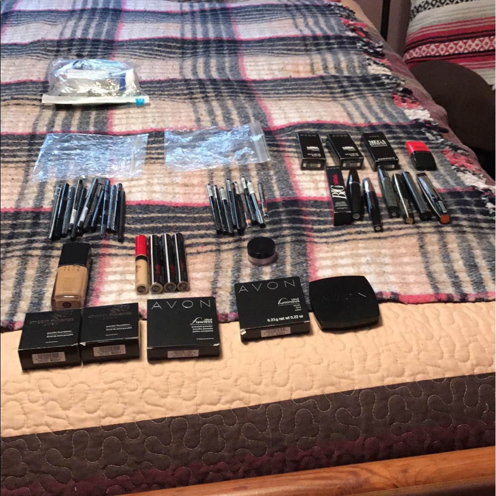 Assortment of Avon makeup