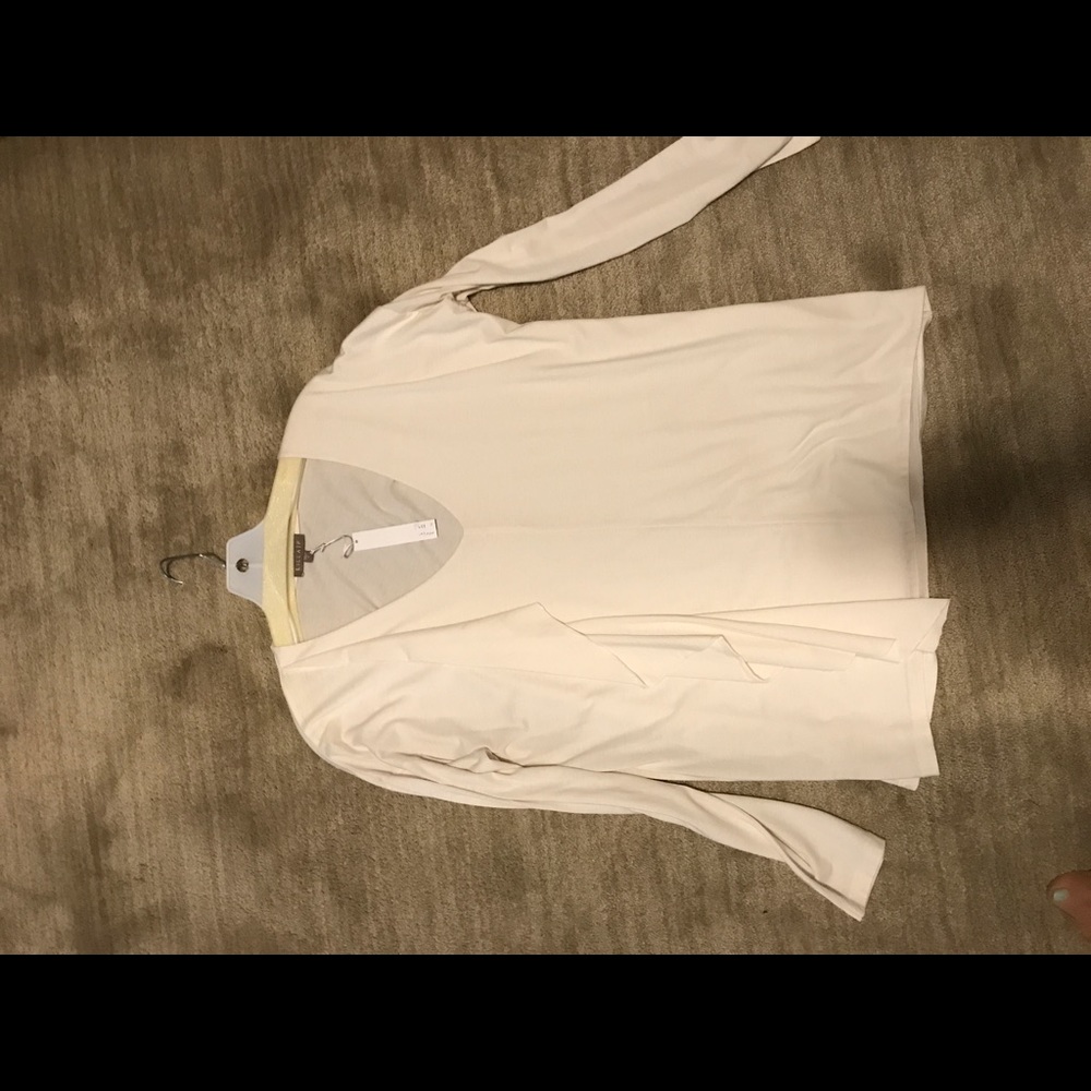 Lilla P cream colored vneck top size small
