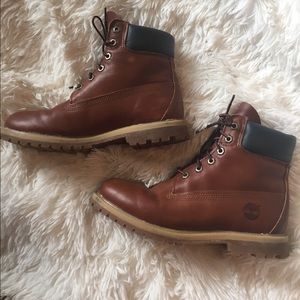 Reddish-brown leather Timberland lace up boots