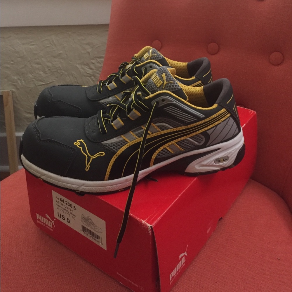 Puma steel toe shoes.