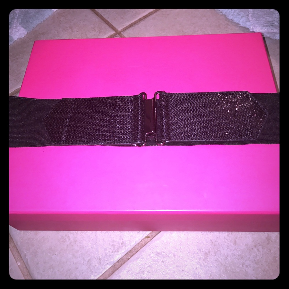 Stretchy worn once belt with black sequins!