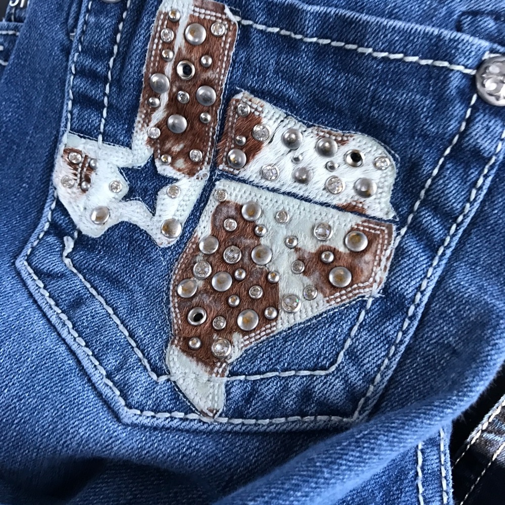 Texas cow hide Miss me jeans