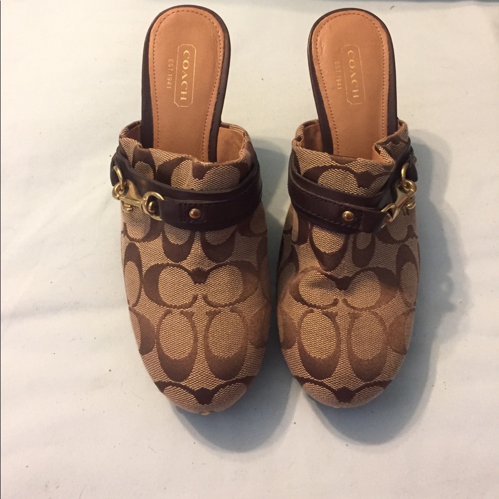Coach clogs.