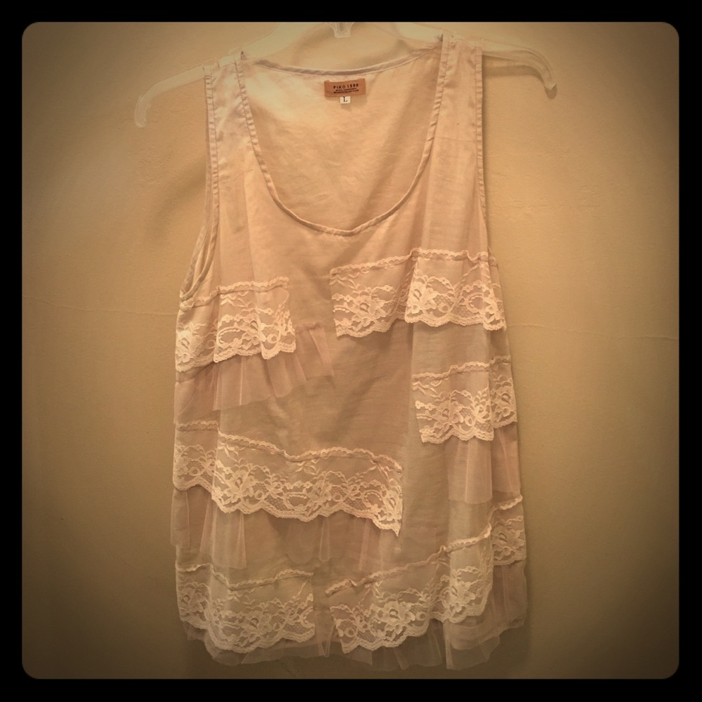 Ruffle tank in beige. Size L