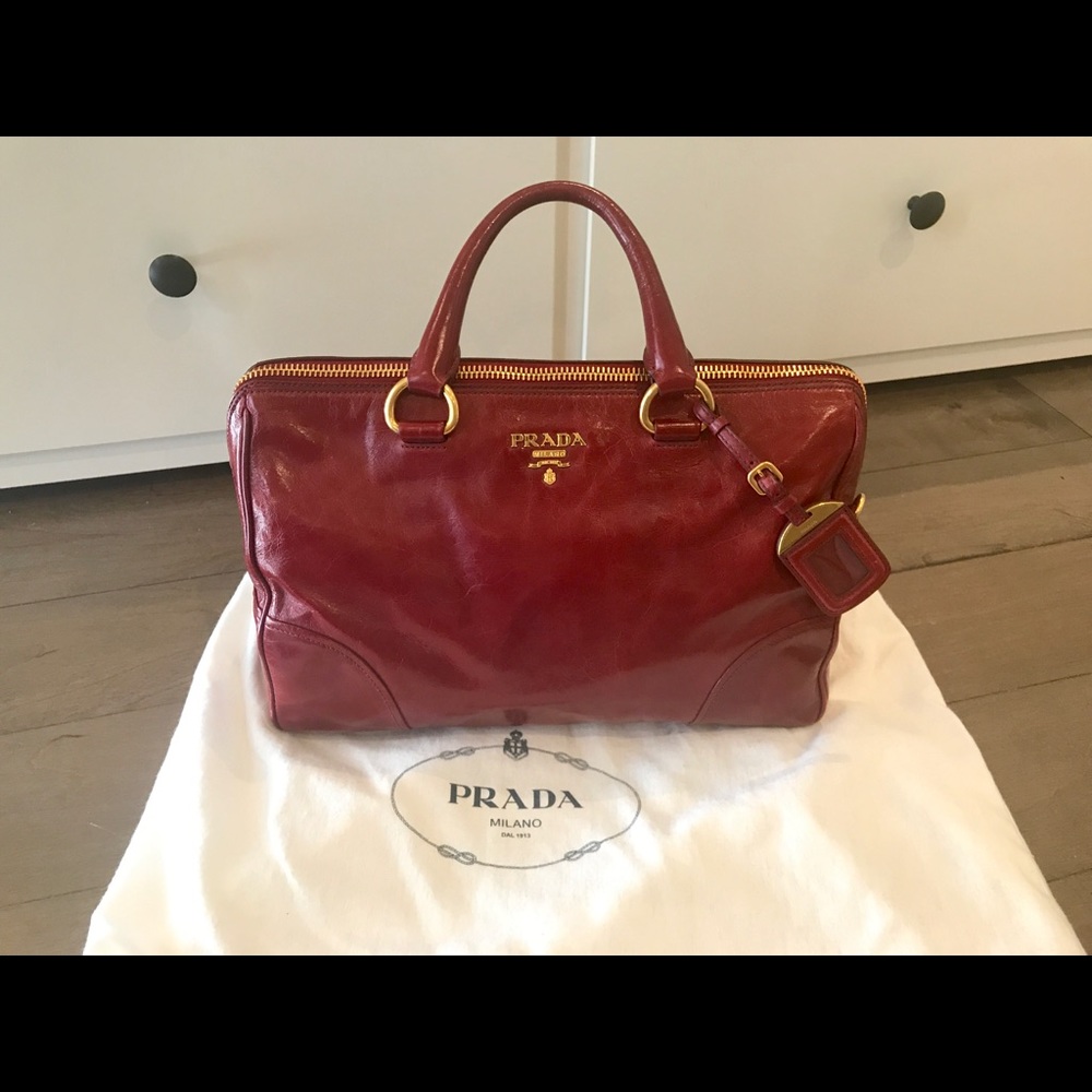 Authentic Prada leather handbag (with strap)