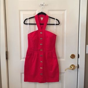Red dress with silver detail and buttons.