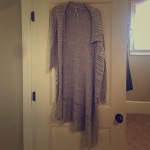 A cute cardigan. Never worn or used.