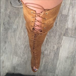 Thigh high lace up boot