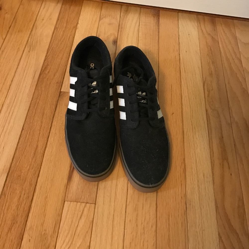 Black and white adidas shoes