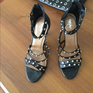 Black strapping emblished heels