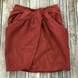 Skirt with folds in front