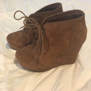 Brown wedge booties