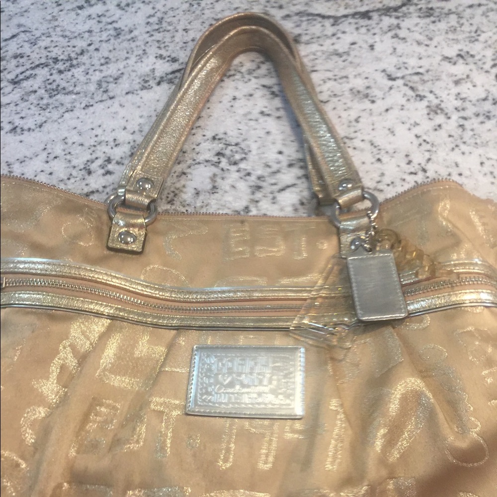 Gold coach purse