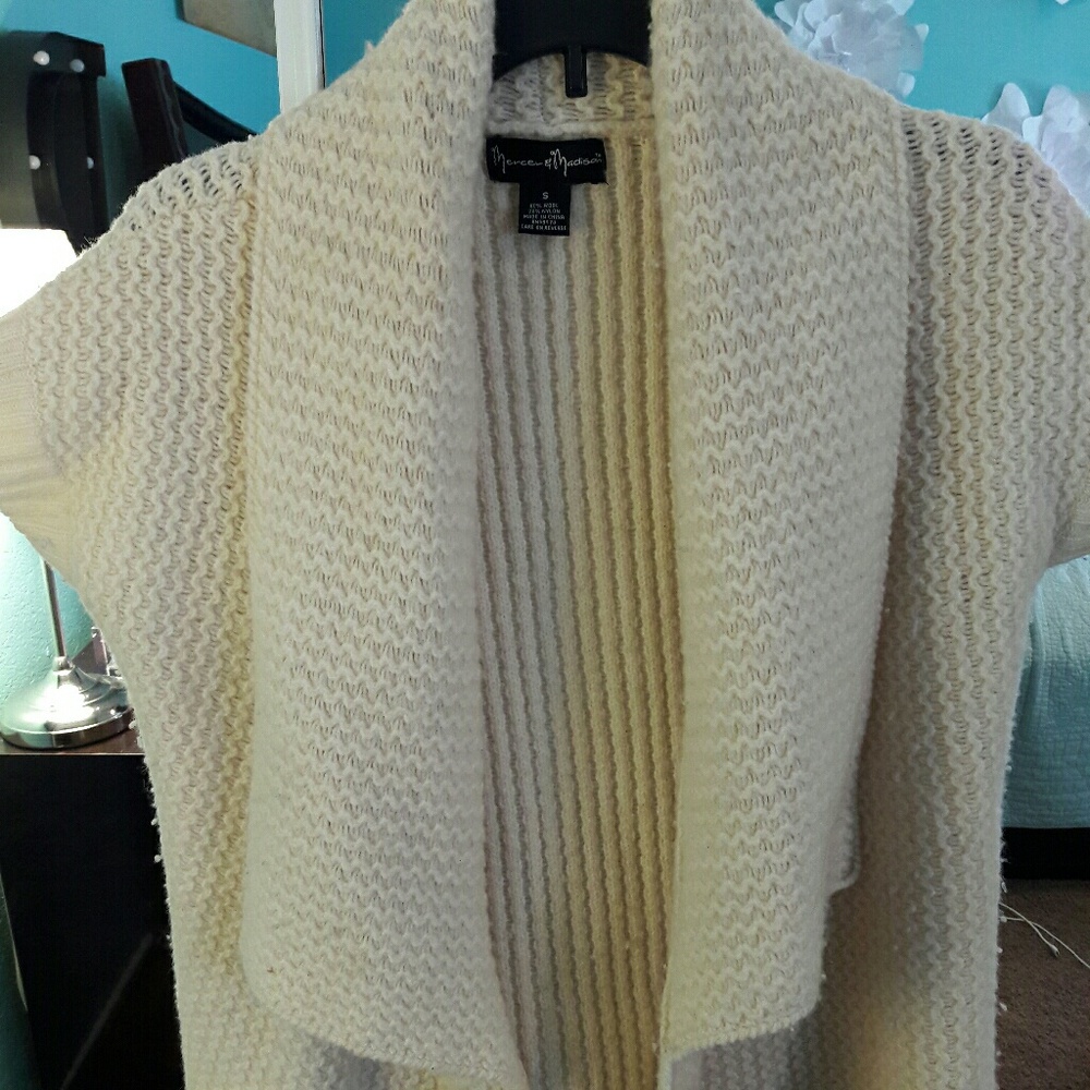 Cream sleeveless cardigan