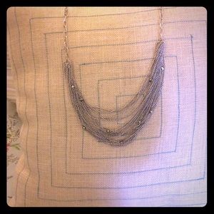 Long silver multi strand necklace