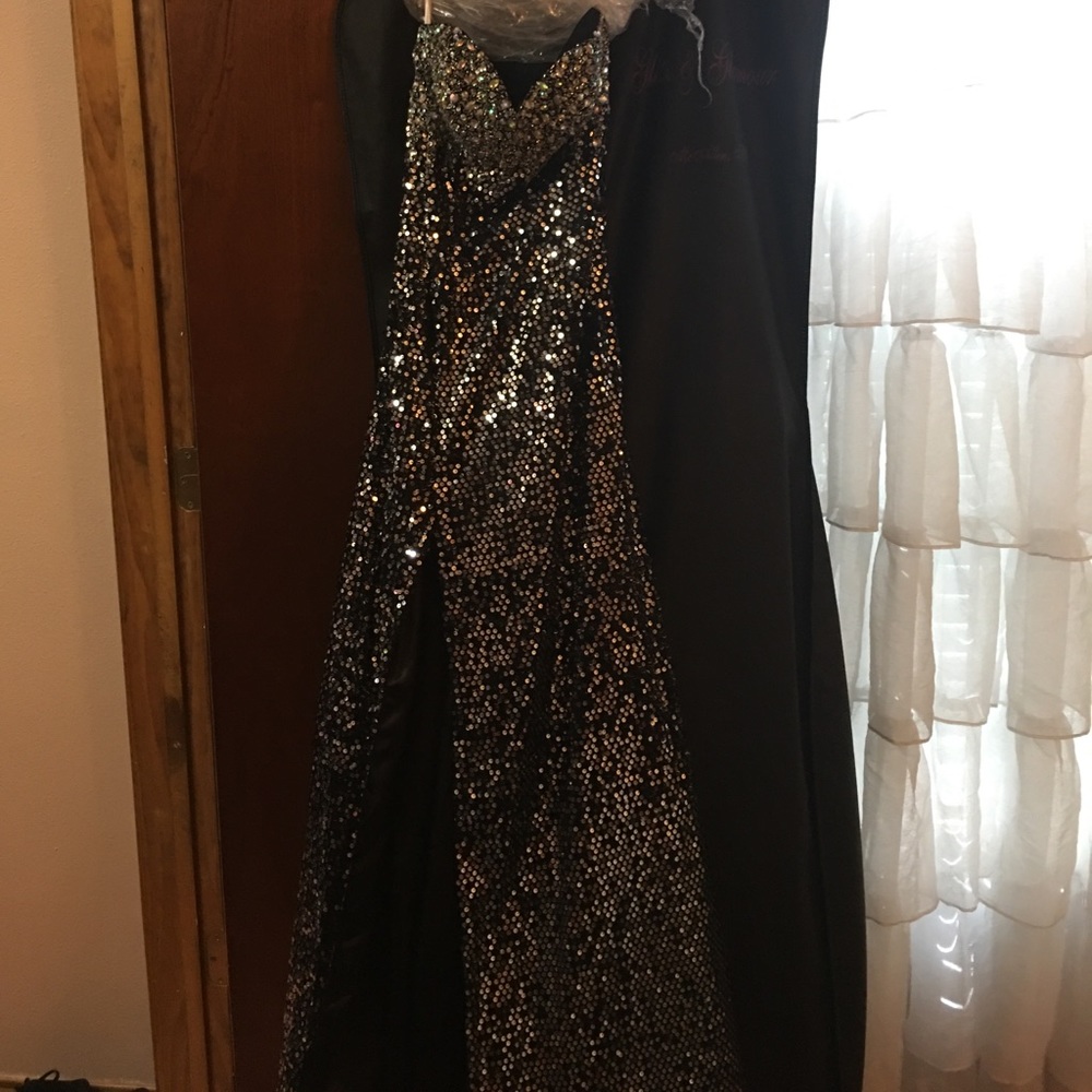 Prom/Dance dress. Fitted black w/ gems and a slit