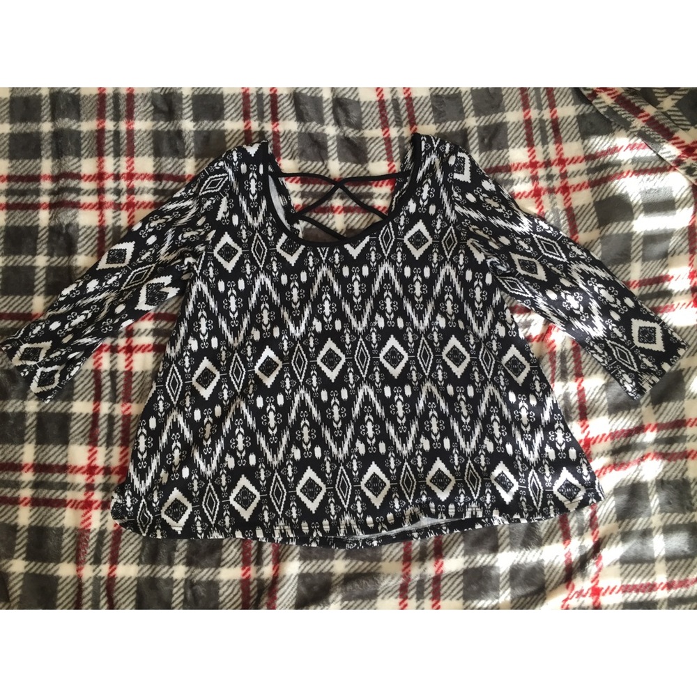 Pattern top with criss cross back.