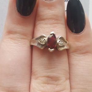 Garnet ring with diamond accents