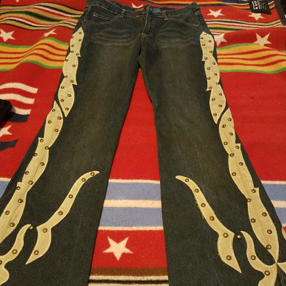 Unique saddle back bellbottom flare studded jeans