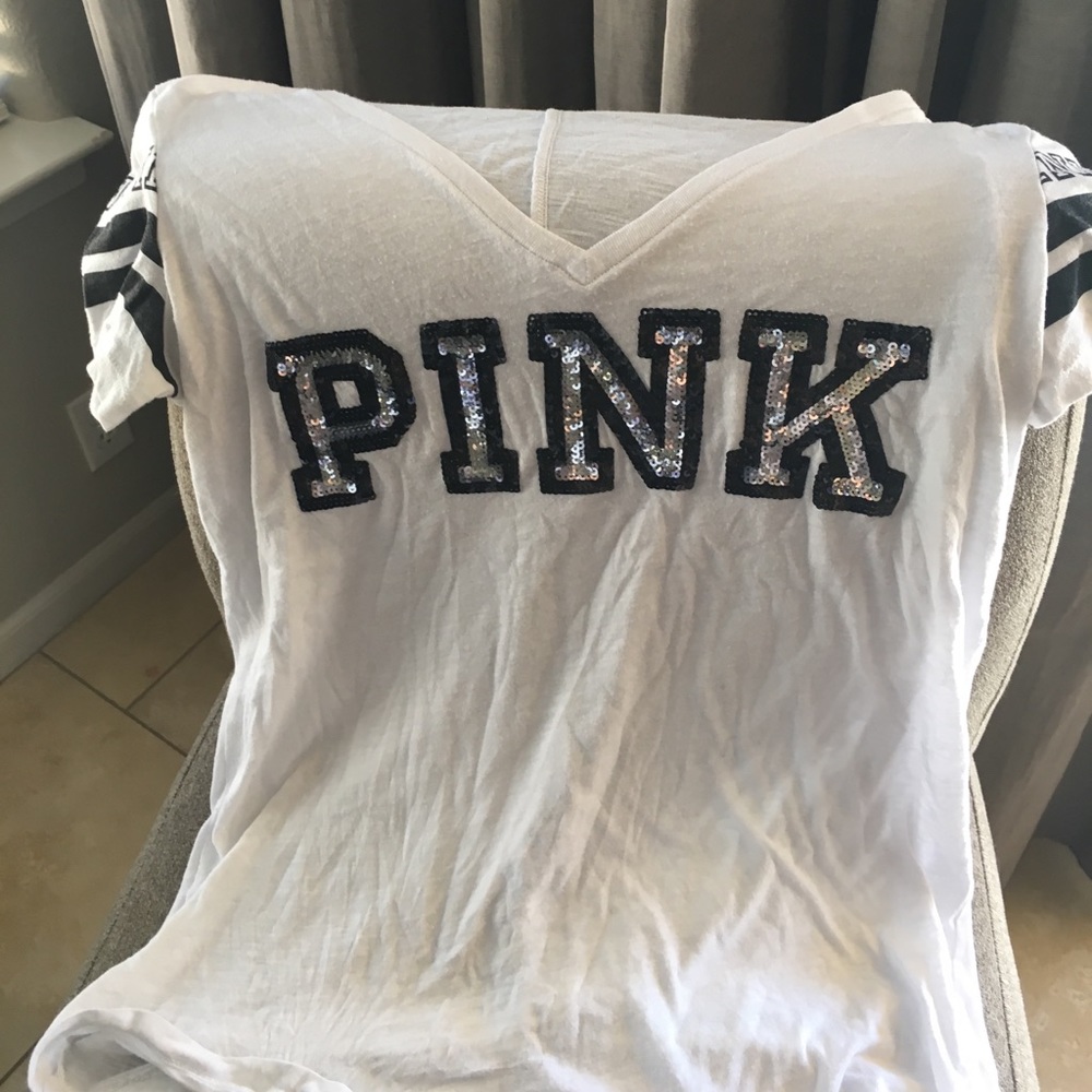 T-shirt, "PINK", states XS, appears more small-med