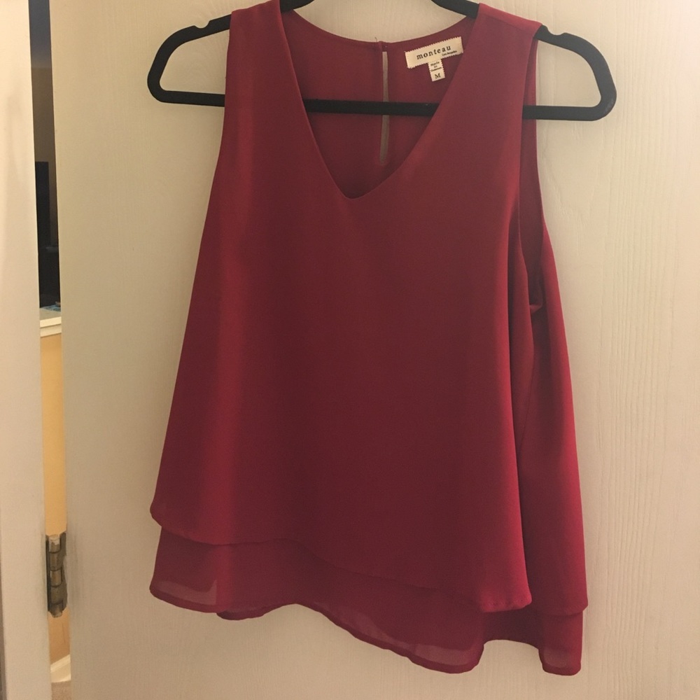 Monteau. Size medium. Red blouse.