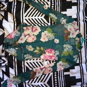 BNWT Beautiful Mesh Onesie piece (Small)