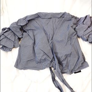 Criss cross blouse with puff sleeves