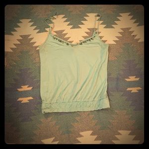 Soft turquoise tank with great detailing