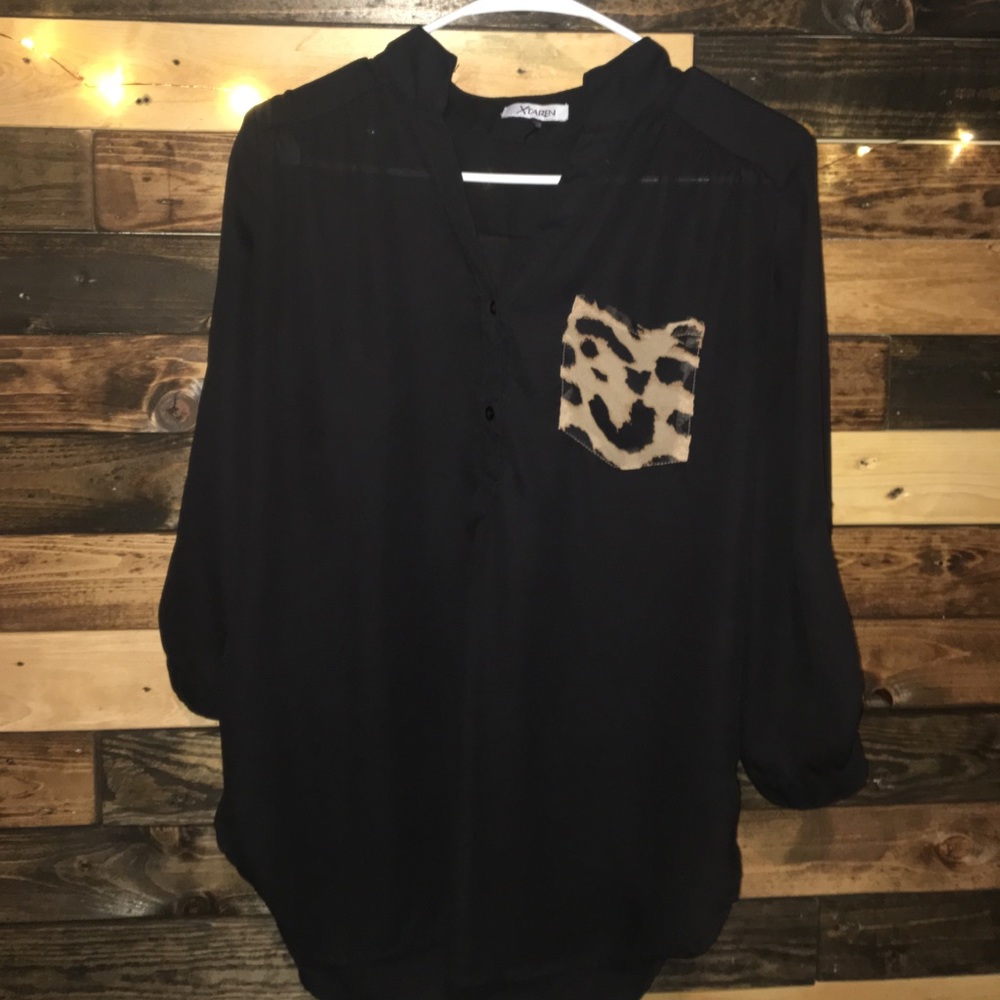 Black top with cheetah print pocket! Size small!