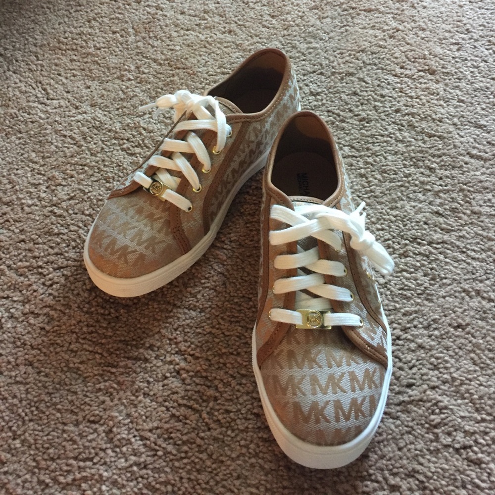MK Sneakers Size 5 kids equivalent to size 7 women