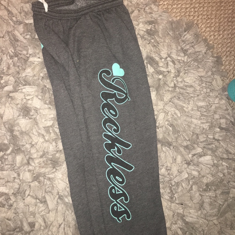 Young and reckless sweat pants