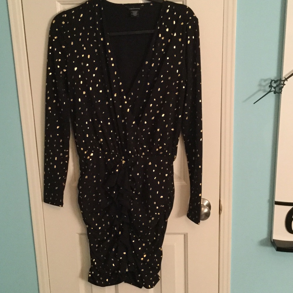 Long sleeve black mini dress with gold metallic