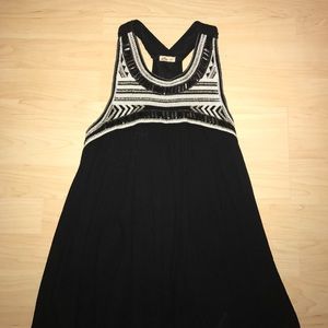 Black top with metallic detailing